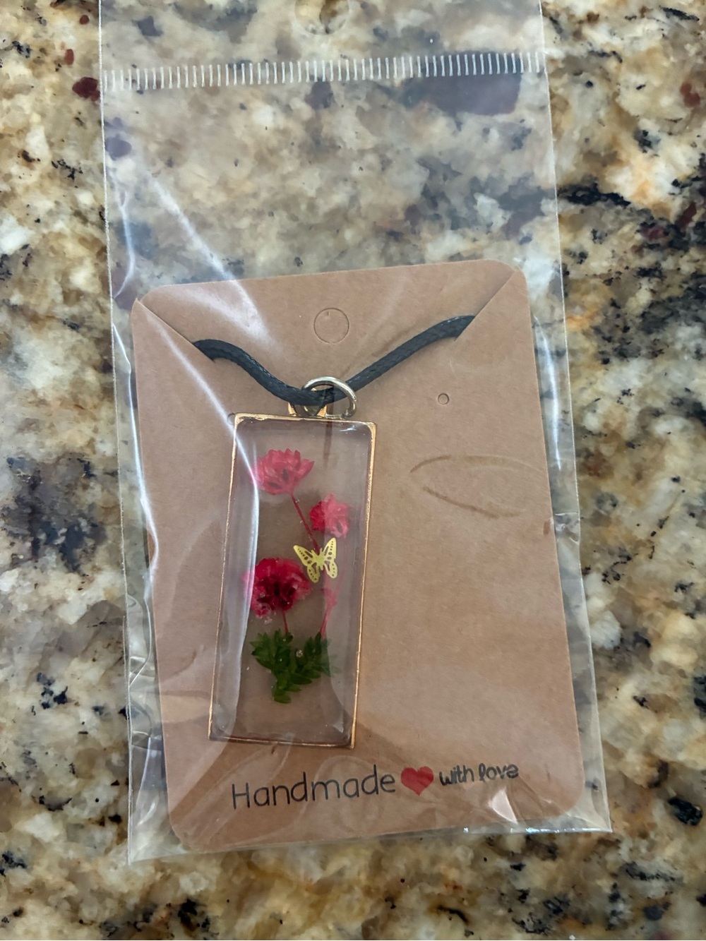 Hand Crafted Pink Floral Resin Necklace with Gold Butterfly Accent